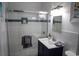 Bathroom with white subway tile and navy blue vanity at 309 21St Ave. N, North Myrtle Beach, SC 29582