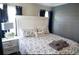 King-size bed in a bedroom with gray and white decor at 309 21St Ave. N, North Myrtle Beach, SC 29582