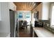 Modern kitchen with stainless steel appliances and wood ceiling at 309 21St Ave. N, North Myrtle Beach, SC 29582