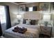 Bedroom with a queen-size bed and gray decor at 309 21St Ave. N, North Myrtle Beach, SC 29582