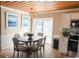 Charming dining area with round table and six chairs, near kitchen at 309 21St Ave. N, North Myrtle Beach, SC 29582