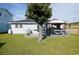 Fenced backyard with deck, gazebo, and grassy area at 309 21St Ave. N, North Myrtle Beach, SC 29582