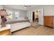 Main bedroom with white platform bed and ceiling fan at 15 Shady Oak Ln., Myrtle Beach, SC 29575