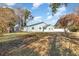 Side yard view of the house, showcasing landscaping and shed at 15 Shady Oak Ln., Myrtle Beach, SC 29575