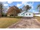 House exterior showcasing a large yard and driveway at 15 Shady Oak Ln., Myrtle Beach, SC 29575