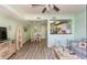 Open living room with coastal decor and view into dining area at 100 North Beach Blvd. # 311, North Myrtle Beach, SC 29582
