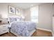 Cozy bedroom with a queen bed and neutral color scheme at 2744 Rowyn St., Longs, SC 29568