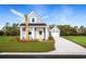 Charming craftsman style home with a two-car garage and landscaped lawn at 2744 Rowyn St., Longs, SC 29568