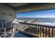 Balcony with ocean and pier view; chairs and table at 6000 N Ocean Blvd. # 304, North Myrtle Beach, SC 29582