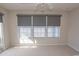 Bright bedroom with large window, blinds, and neutral carpet at 105 Bonnie Bridge Circle, Myrtle Beach, SC 29579