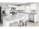 Modern kitchen with white cabinets, granite countertops, and stainless steel appliances at 3006 Nw Edgemead Circle # B, Calabash, NC 28467