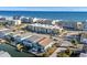 Aerial view of beachfront property showing ocean, home, and surrounding buildings at 4801 North Ocean Blvd. # 3N, North Myrtle Beach, SC 29582