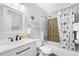 Clean bathroom with tub shower, vanity, and starfish shower curtain at 4801 North Ocean Blvd. # 3N, North Myrtle Beach, SC 29582