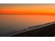 Stunning sunset over the ocean with a beautiful orange sky at 8500 Margate Circle # 2704, Myrtle Beach, SC 29572