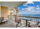 Relaxing oceanfront balcony with table and chairs at 8500 Margate Circle # 2704, Myrtle Beach, SC 29572