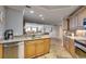 Open kitchen with granite countertops, stainless steel appliances and custom cabinetry at 8500 Margate Circle # 2704, Myrtle Beach, SC 29572