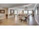 Spacious dining area with a large wooden table and seating for six, overlooking an ocean view at 8500 Margate Circle # 2704, Myrtle Beach, SC 29572