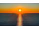 Orange sunrise reflecting on the ocean surface at 8500 Margate Circle # 2704, Myrtle Beach, SC 29572