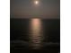 Bright moon reflecting on a tranquil ocean at night at 8500 Margate Circle # 2704, Myrtle Beach, SC 29572