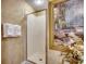 Clean shower with glass enclosure and tranquil wall art at 8500 Margate Circle # 2704, Myrtle Beach, SC 29572