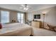 Primary bedroom with ocean view and built-in dresser at 8500 Margate Circle # 2704, Myrtle Beach, SC 29572