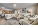 Open living room with adjacent kitchen and seating area at 8500 Margate Circle # 2704, Myrtle Beach, SC 29572