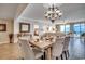 Bright dining room featuring a rustic wooden table and comfortable seating for six at 8500 Margate Circle # 2704, Myrtle Beach, SC 29572