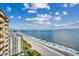 Aerial view showcasing ocean, beach, and building at 8500 Margate Circle # 2704, Myrtle Beach, SC 29572