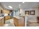 Modern kitchen with stainless steel appliances and light wood cabinets at 8500 Margate Circle # 2704, Myrtle Beach, SC 29572