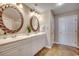 Double vanity bathroom with large mirrors at 8500 Margate Circle # 2704, Myrtle Beach, SC 29572