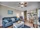 Open concept living and dining area with a white coffee table at 814 N Waccamaw Dr. # 311, Garden City Beach, SC 29576