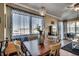 Dining area with wooden table and chairs, and ocean view at 814 N Waccamaw Dr. # 311, Garden City Beach, SC 29576