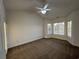 Spacious bedroom featuring a ceiling fan and large window at 4878 Luster Leaf Circle # 404, Myrtle Beach, SC 29577