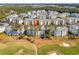 Aerial view of condo community showing building location and surrounding golf course at 4878 Luster Leaf Circle # 404, Myrtle Beach, SC 29577