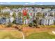Aerial view of condo community showing building location and surrounding golf course at 4878 Luster Leaf Circle # 404, Myrtle Beach, SC 29577