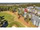Aerial view of condo community showing building location and surrounding golf course at 4878 Luster Leaf Circle # 404, Myrtle Beach, SC 29577