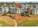 Aerial view of condo building and location near golf course at 4878 Luster Leaf Circle # 404, Myrtle Beach, SC 29577
