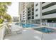 Inviting outdoor pool area with lounge chairs at 1401 S S Ocean Blvd. # 703, North Myrtle Beach, SC 29582