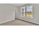 Bright bedroom with carpet flooring and window view at 550 Wagon Wheel Trail, Calabash, NC 28467