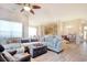 Open concept living room with sectional sofa and hardwood floors at 296 Palmetto Glen Dr., Myrtle Beach, SC 29588