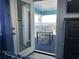 Private balcony with ocean view and small table and chairs at 700 N Waccamaw Dr. # 319, Garden City Beach, SC 29576