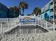 White stairs leading to the Beach House at Garden City at 700 N Waccamaw Dr. # 319, Garden City Beach, SC 29576