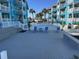 Relaxing pool deck with lounge chairs at 700 N Waccamaw Dr. # 319, Garden City Beach, SC 29576