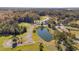 Aerial view of a waterfront community with houses and ponds at 852 Comanders Island Rd., Georgetown, SC 29440