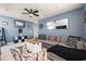 Spacious bonus room with sectional sofa and coffee table at 1099 Saltgrass Way, Myrtle Beach, SC 29588