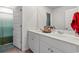 Clean bathroom with double vanity, shower, and ample storage at 1099 Saltgrass Way, Myrtle Beach, SC 29588