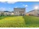 Large backyard with a covered patio, great for outdoor living at 1099 Saltgrass Way, Myrtle Beach, SC 29588