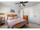 Serene bedroom with a double bed, dresser, and adjacent bathroom access at 1099 Saltgrass Way, Myrtle Beach, SC 29588