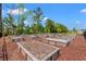 Community garden with raised beds for residents at 1099 Saltgrass Way, Myrtle Beach, SC 29588