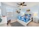 Light and airy bedroom with a queen bed and calming decor at 1099 Saltgrass Way, Myrtle Beach, SC 29588